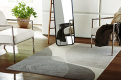 J&M Furniture - Ashley Furniture - Winderburg 5' x 7' Rug - 5' x 7' Rug / Gray/Ivory - R406952