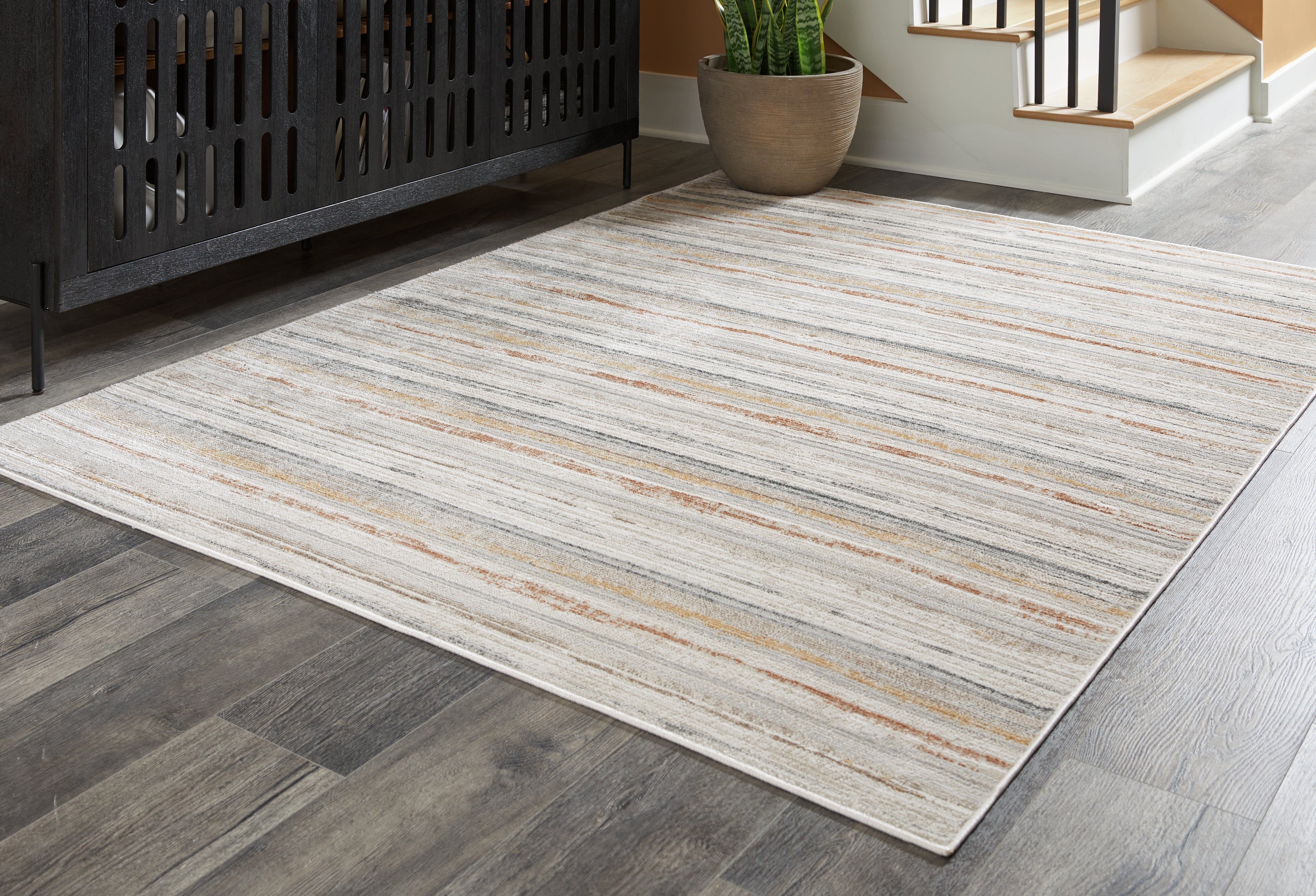 J&M Furniture - Ashley Furniture - Artney 8' x 10' Rug - 8' x 10' Rug / Multi - R407021