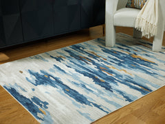 J&M Furniture - Ashley Furniture - Vinlett 5' x 7' Washable Rug - 5' x 7' Washable Rug / Cream/Blue/Brown - R407042