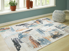 J&M Furniture - Ashley Furniture - Hessland 8' x 10' Washable Rug - 8' x 10' Washable Rug / Multi - R407051