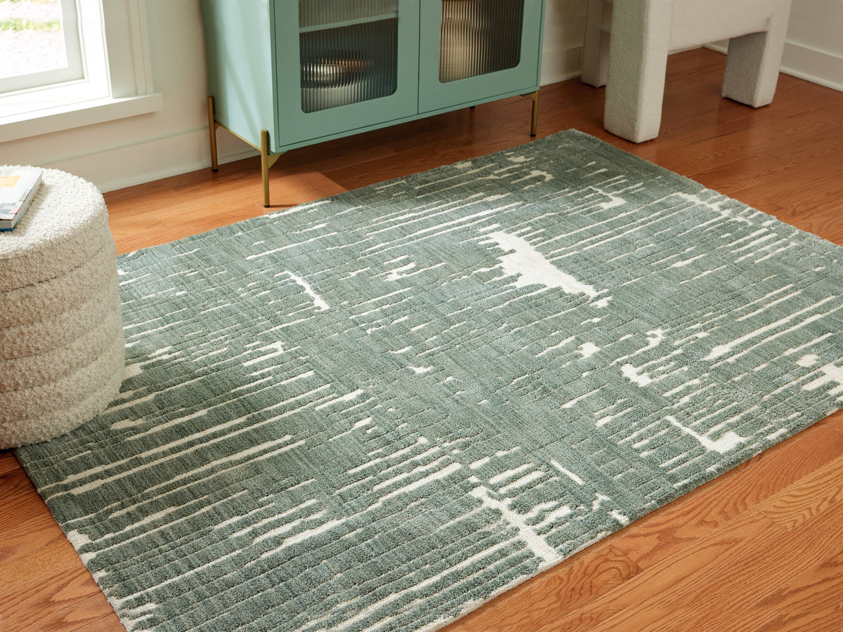 J&M Furniture - Ashley Furniture - Cayworth 5' x 7' Rug - 5' x 7' Rug / Teal/White - R407092