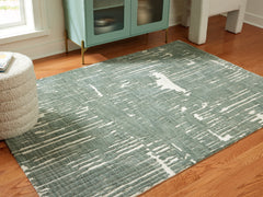 J&M Furniture - Ashley Furniture - Cayworth 5' x 7' Rug - 5' x 7' Rug / Teal/White - R407092