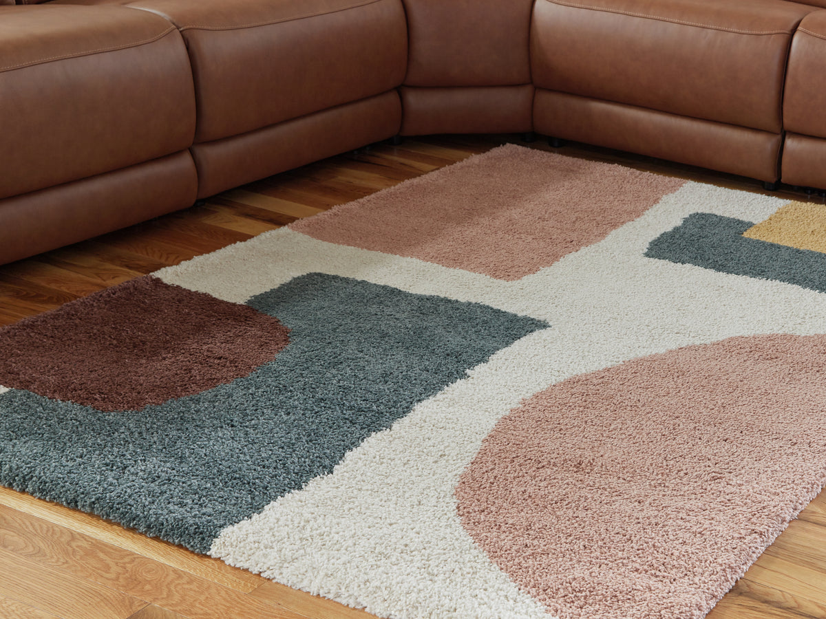 J&M Furniture - Ashley Furniture - Flynnwick 5' x 7' Rug - 5' x 7' Rug / Cream/Pink/Gray - R407182