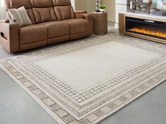 J&M Furniture - Ashley Furniture - Idaman Large Rug - Large Rug / Taupe/Brown - R407291