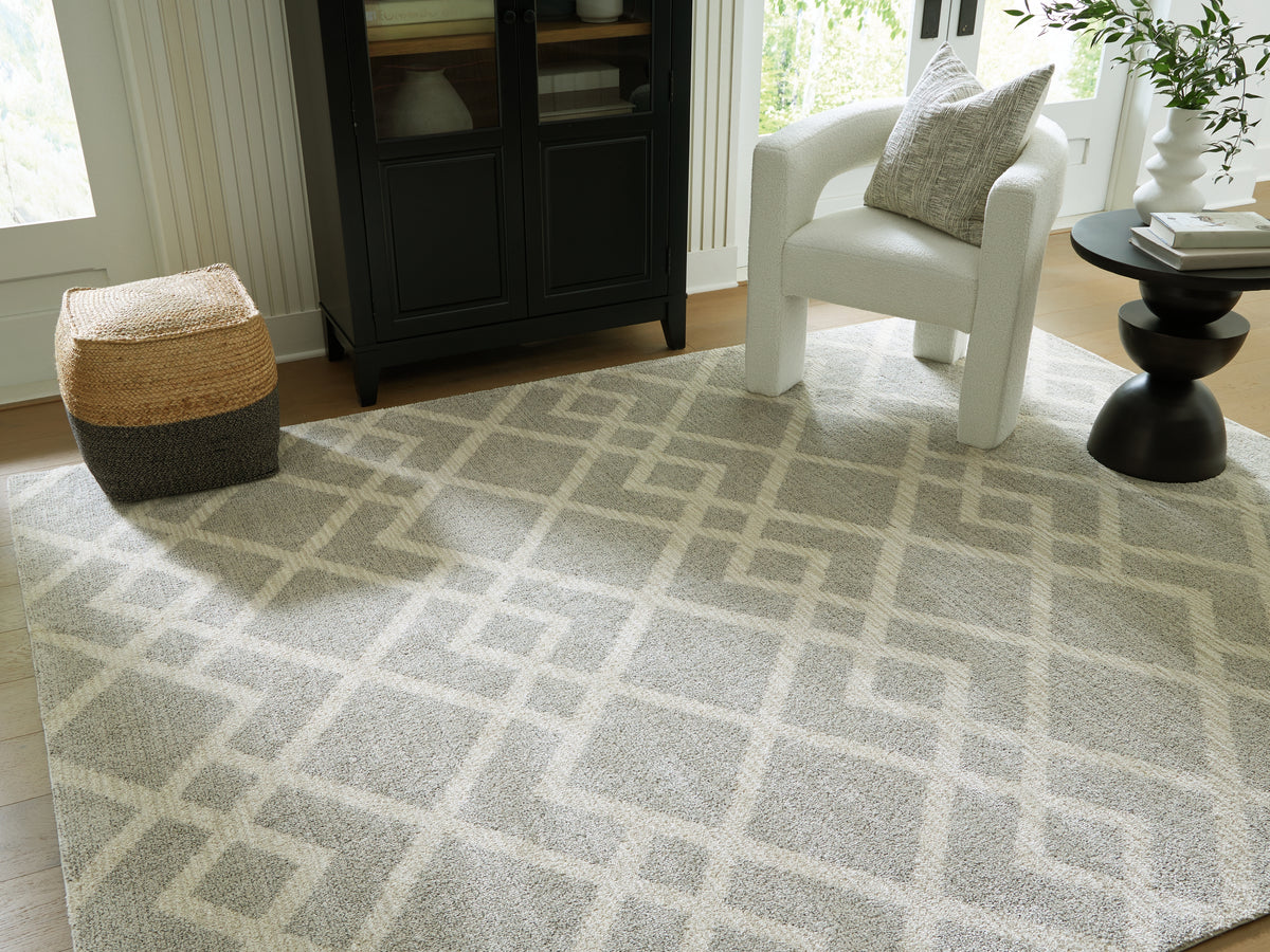J&M Furniture - Ashley Furniture - Unawick Large Rug - Large Rug / Gray/Ivory - R407331