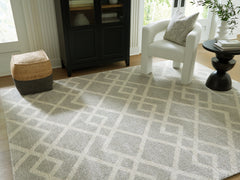 J&M Furniture - Ashley Furniture - Unawick Large Rug - Large Rug / Gray/Ivory - R407331