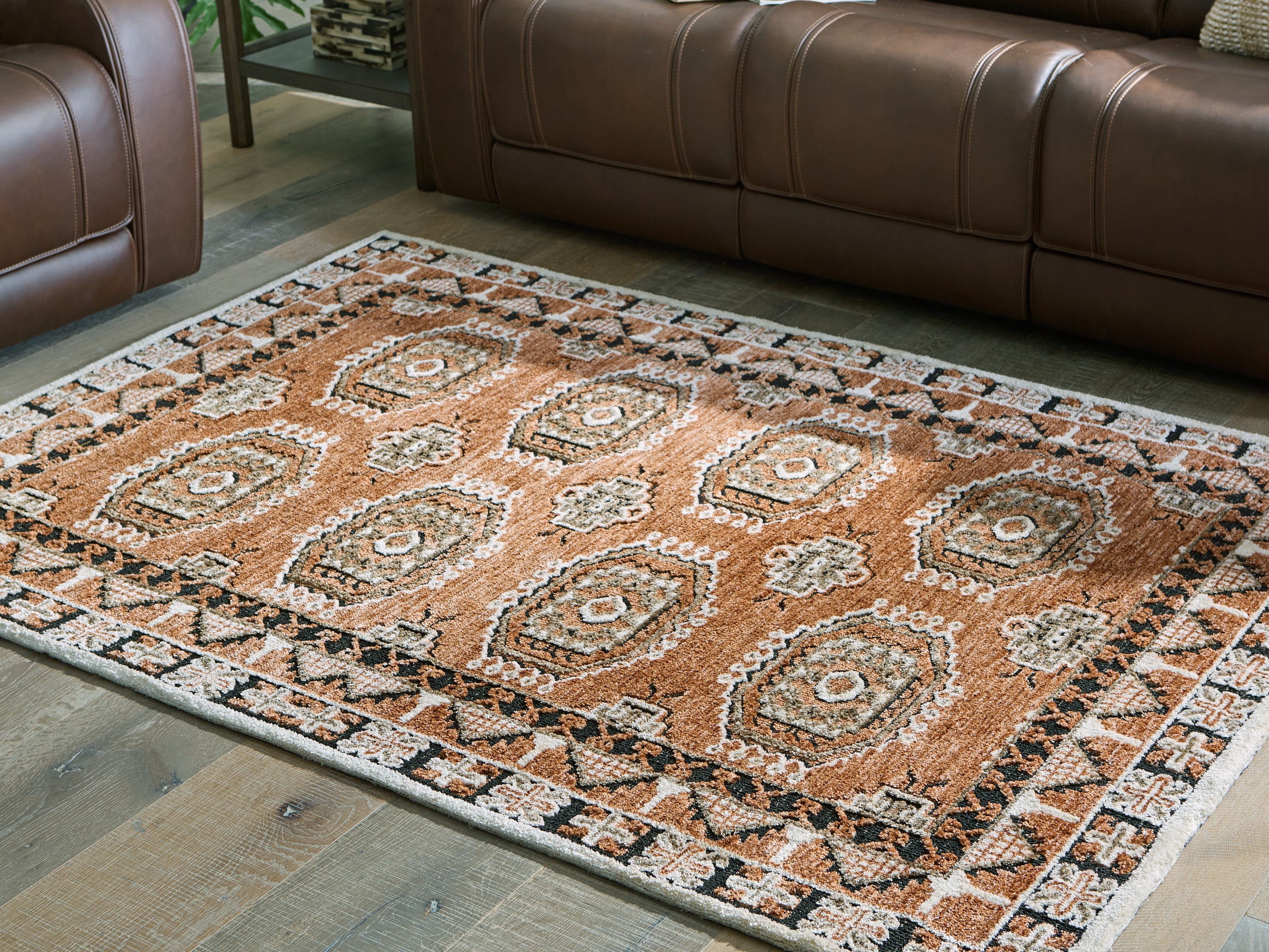 J&M Furniture - Ashley Furniture - Qaabiz 5' x 7' Area Rug - 5' x 7' Area Rug / Sienna/Ivory/Black - R407522