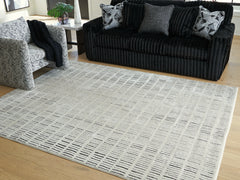 J&M Furniture - Ashley Furniture - Turinwith 7'10" x 9'10" Area Rug - 7'10" x 9'10" Area Rug / Ivory/Black - R407551