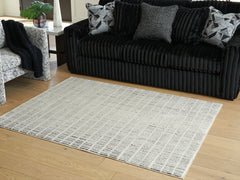 J&M Furniture - Ashley Furniture - Turinwith 5'3" x 7' Area Rug - 5'3" x 7' Area Rug / Ivory/Black - R407552