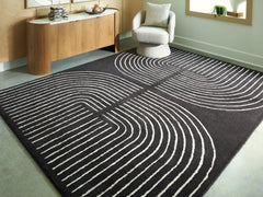 J&M Furniture - Ashley Furniture - Eldonmore 7'8" x 10' Area Rug - 7'8" x 10' Area Rug / Black/Ivory - R407571