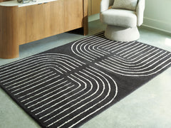 J&M Furniture - Ashley Furniture - Eldonmore 5' x 7' Area Rug - 5' x 7' Area Rug / Black/Ivory - R407572