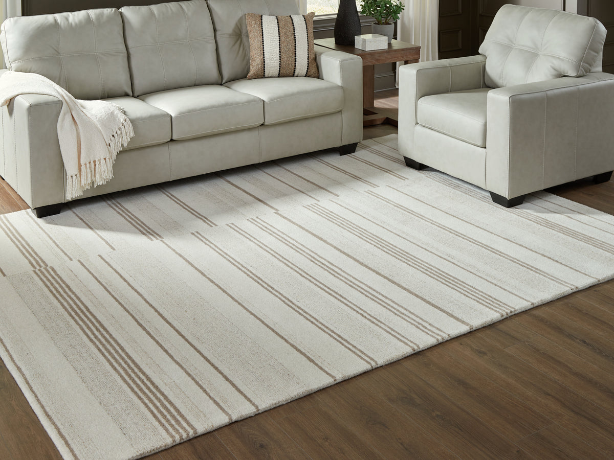 J&M Furniture - Ashley Furniture - Gadence 7'8" x 10' Area Rug - 7'8" x 10' Area Rug / Ivory/Tan - R407641