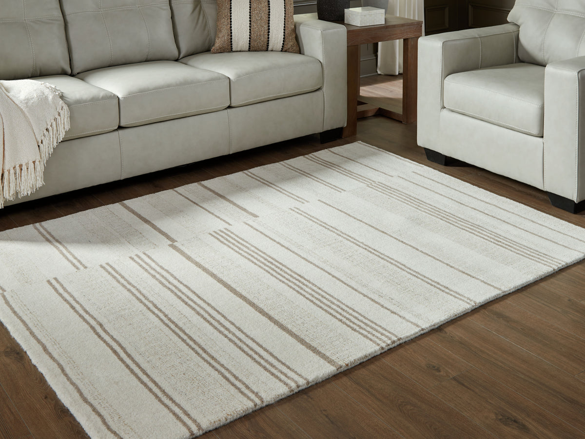 J&M Furniture - Ashley Furniture - Gadence 5' x 7' Area Rug - 5' x 7' Area Rug / Ivory/Tan - R407642
