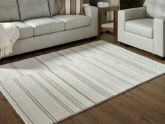 J&M Furniture - Ashley Furniture - Gadence 5' x 7' Area Rug - 5' x 7' Area Rug / Ivory/Tan - R407642