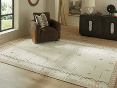 J&M Furniture - Ashley Furniture - Dot 7'8" x 10' Area Rug - 7'8" x 10' Area Rug / Cream/Brown/Taupe - R407651