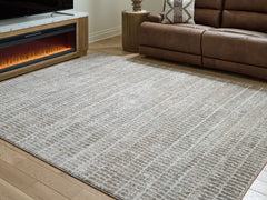 J&M Furniture - Ashley Furniture - Fuadwick 7'10" x 10' Area Rug - 7'10" x 10' Area Rug / Multi - R407691