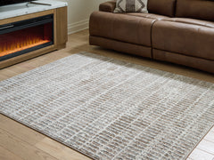 J&M Furniture - Ashley Furniture - Fuadwick 5'3" x 7' Area Rug - 5'3" x 7' Area Rug / Multi - R407692