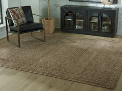 J&M Furniture - Ashley Furniture - Merrittman 7'8" x 10' Area Rug - 7'8" x 10' Area Rug / Brown/Ivory - R407701