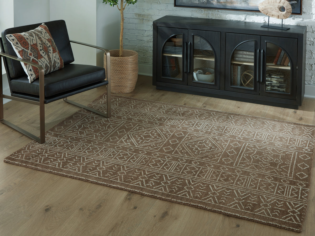 J&M Furniture - Ashley Furniture - Merrittman 5' x 7' Area Rug - 5' x 7' Area Rug / Brown/Ivory - R407702