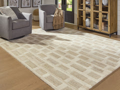 J&M Furniture - Ashley Furniture - Lisgrove 7'8" x 10' Area Rug - 7'8" x 10' Area Rug / Tan/Brown/White - R407711
