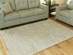 J&M Furniture - Ashley Furniture - Jaseena 5' x 7' Area Rug - 5' x 7' Area Rug / Beige/Tan - R407722