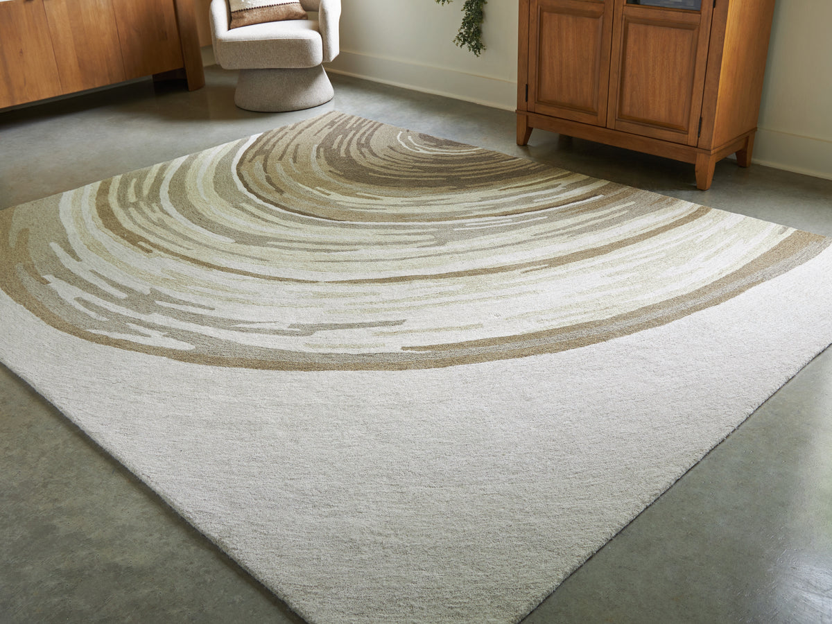 J&M Furniture - Ashley Furniture - Rizwana 7'6" x 10' Area Rug - 7'6" x 10' Area Rug / Ivory/Brown/Gray - R407761