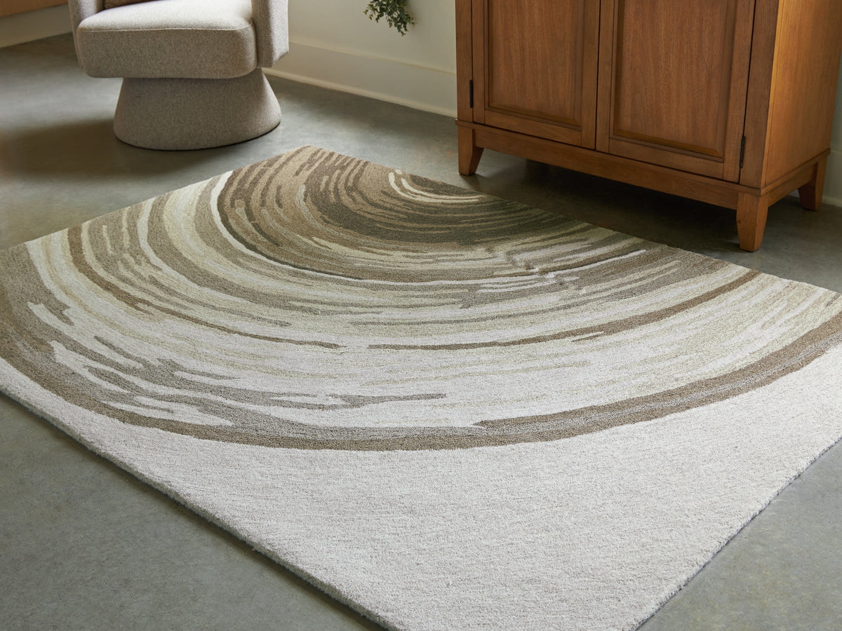J&M Furniture - Ashley Furniture - Rizwana 5' x 7' Area Rug - 5' x 7' Area Rug / Ivory/Brown/Gray - R407762