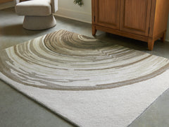 J&M Furniture - Ashley Furniture - Rizwana 5' x 7' Area Rug - 5' x 7' Area Rug / Ivory/Brown/Gray - R407762