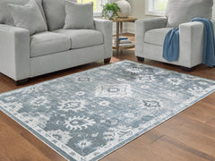 J&M Furniture - Ashley Furniture - Avanworths Washable 5'3" x 7' Area Rug - Washable 5'3" x 7' Area Rug / Blue/Gray/Ivory - R407792