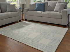 J&M Furniture - Ashley Furniture - Dylanton 5' x 7' Area Rug - 5' x 7' Area Rug / Ivory/Blue - R407812