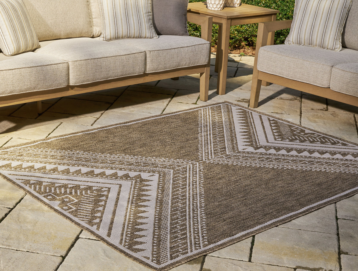 J&M Furniture - Ashley Furniture - Dunsler 8' x 10' Rug - 8' x 10' Rug / Brown/Cream - R900011