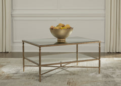 J&M Furniture - Ashley Furniture - Cloverty Coffee Table - Rectangular Cocktail Table / Aged Gold Finish - T440-1