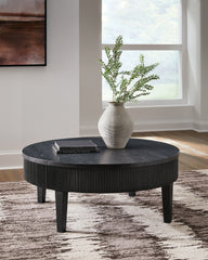 J&M Furniture - Ashley Furniture - Marstream Coffee Table - Round Cocktail Table / Black - T551-8