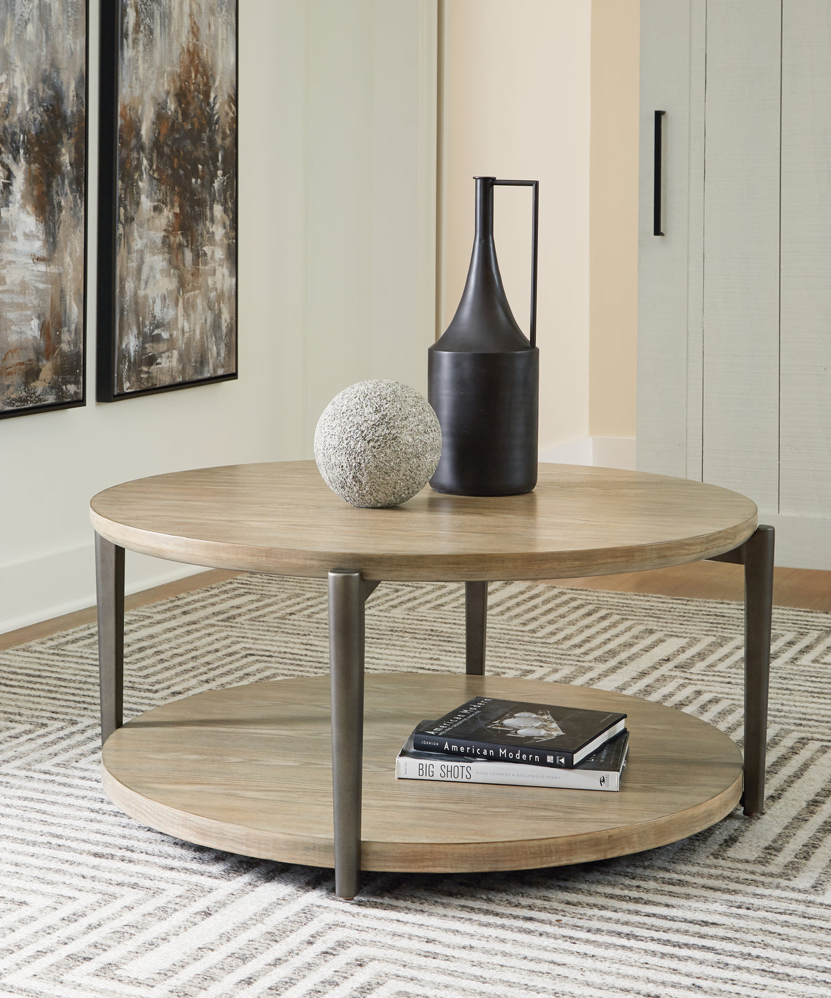 J&M Furniture - Ashley Furniture - Dyonton Coffee Table - Round Cocktail Table / Light Grayish Brown - T574-8