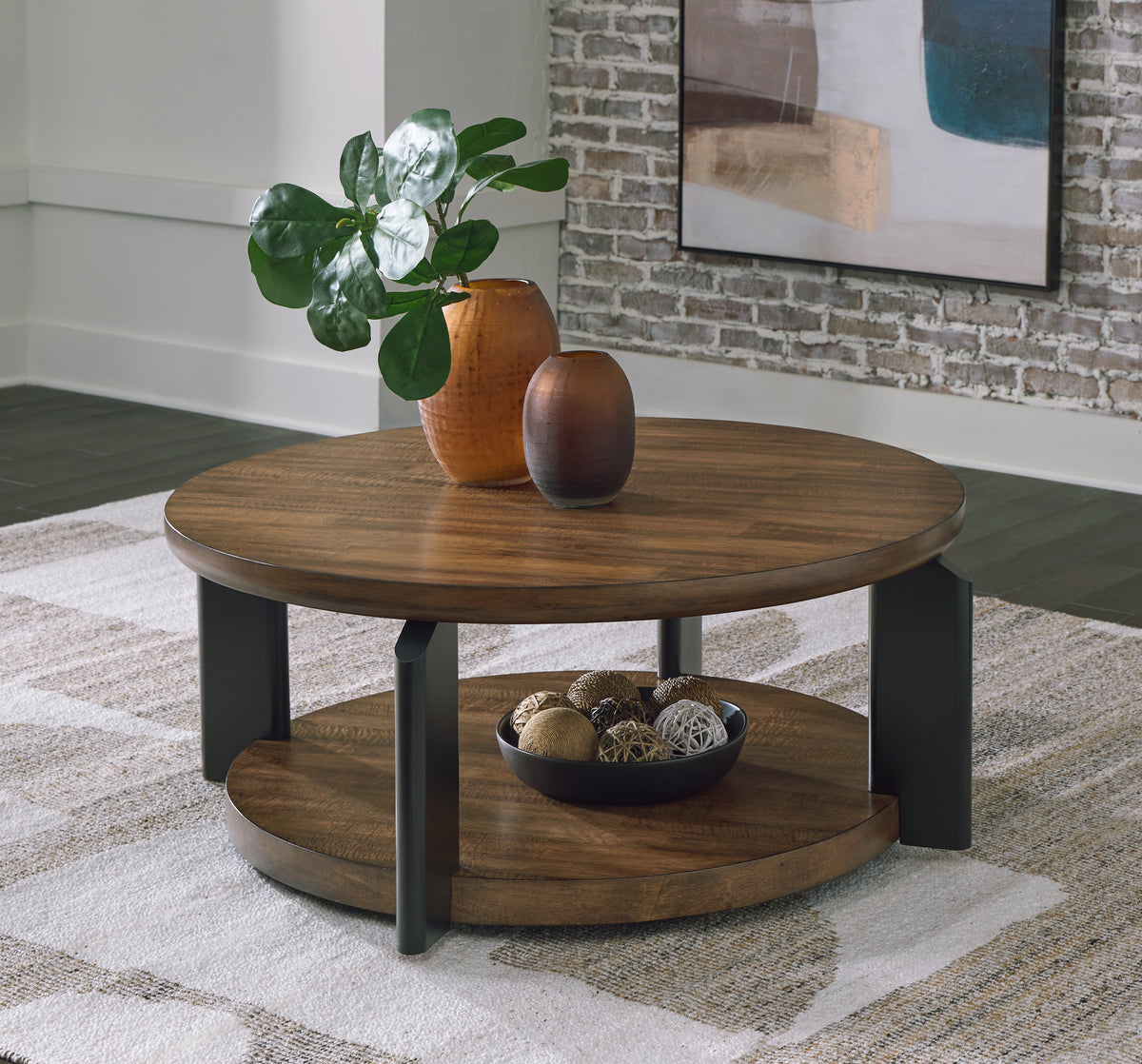 J&M Furniture - Ashley Furniture - Kraeburn Coffee Table - Round Cocktail Table / Brown/Black - T624-8