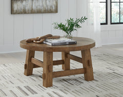 J&M Furniture - Ashley Furniture - Mackifeld Coffee Table - Round Cocktail Table / Warm Brown - T724-8