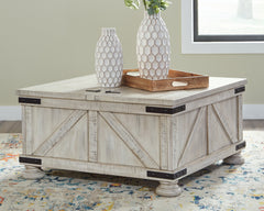 J&M Furniture - Ashley Furniture - Carynhurst Coffee Table - Cocktail Table with Storage / Whitewash - T929-20