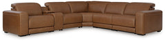J&M Furniture - Ashley Furniture - Magic Man 6-Piece Power Reclining Sectional with Console - 6-Piece Power Reclining Sectional with Console / Caramel - PCU10700S8