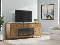 J&M Furniture - Ashley Furniture - Sharlance 81" TV Stand with Electric Fireplace - 81" TV Stand with Electric Fireplace / Light Brown - W655W1