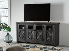 J&M Furniture - Ashley Furniture - Tyler Creek 74" TV Stand - 74" / Black/Gray - W736-68