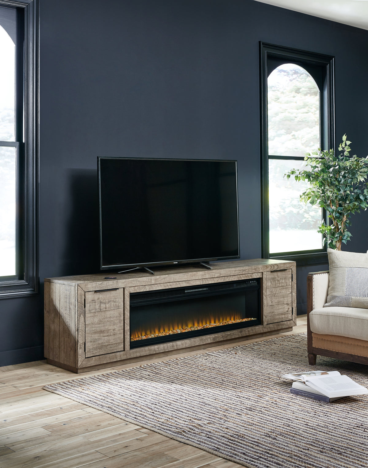 J&M Furniture - Ashley Furniture - Krystanza TV Stand with Electric Fireplace - TV Stand with Electric Fireplace / Weathered Gray - W760W1