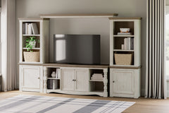 J&M Furniture - Ashley Furniture - Havalance 4-Piece Entertainment Center - 4-Piece Entertainment Center / Two-tone - W814W1