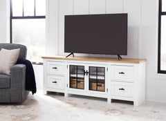 J&M Furniture - Ashley Furniture - Ashbryn 74" TV Stand - 74" / White/Natural - W844-68